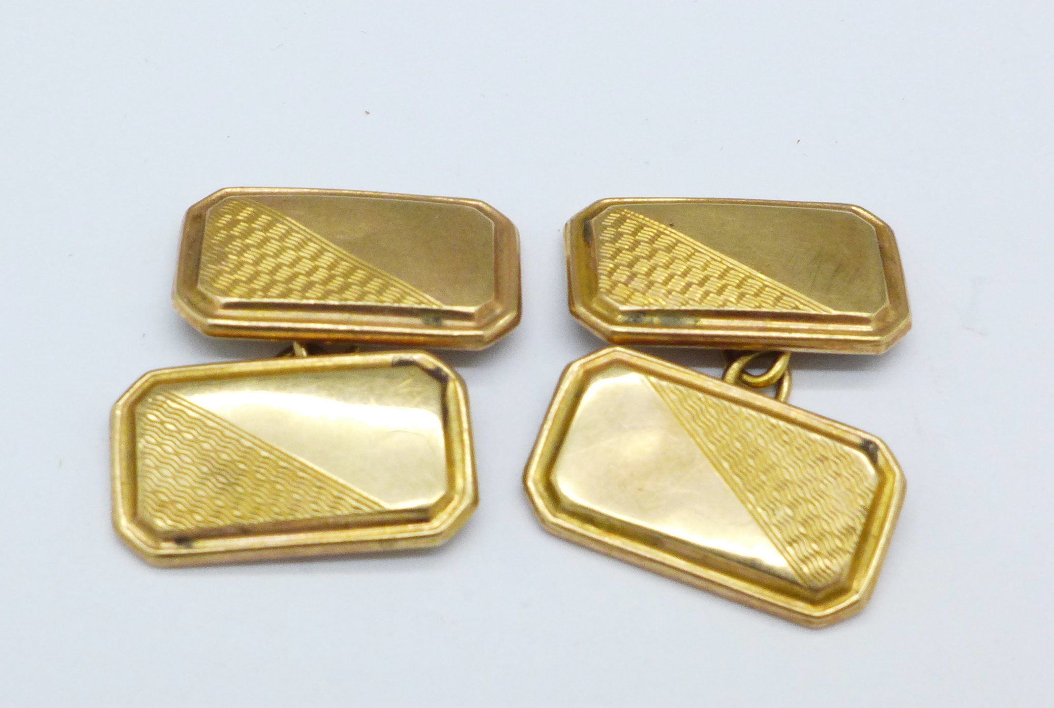 A pair of 9ct gold cufflinks, Chester 1935, 2.