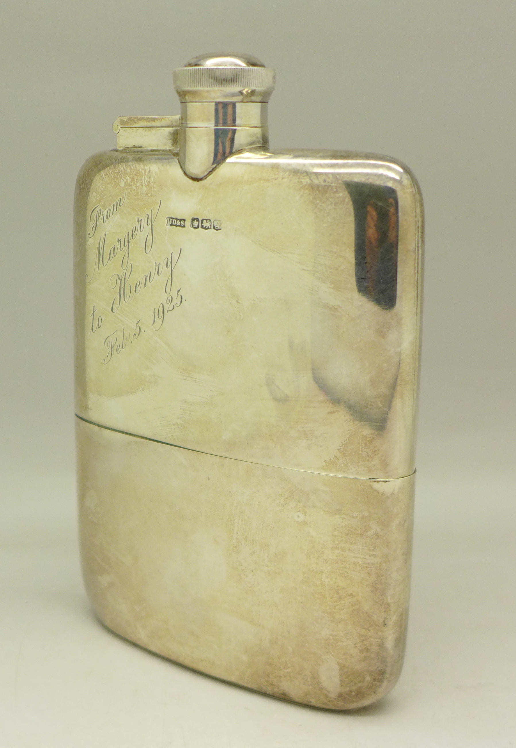 A silver hip flask, with inscription dated 1925, 295g,