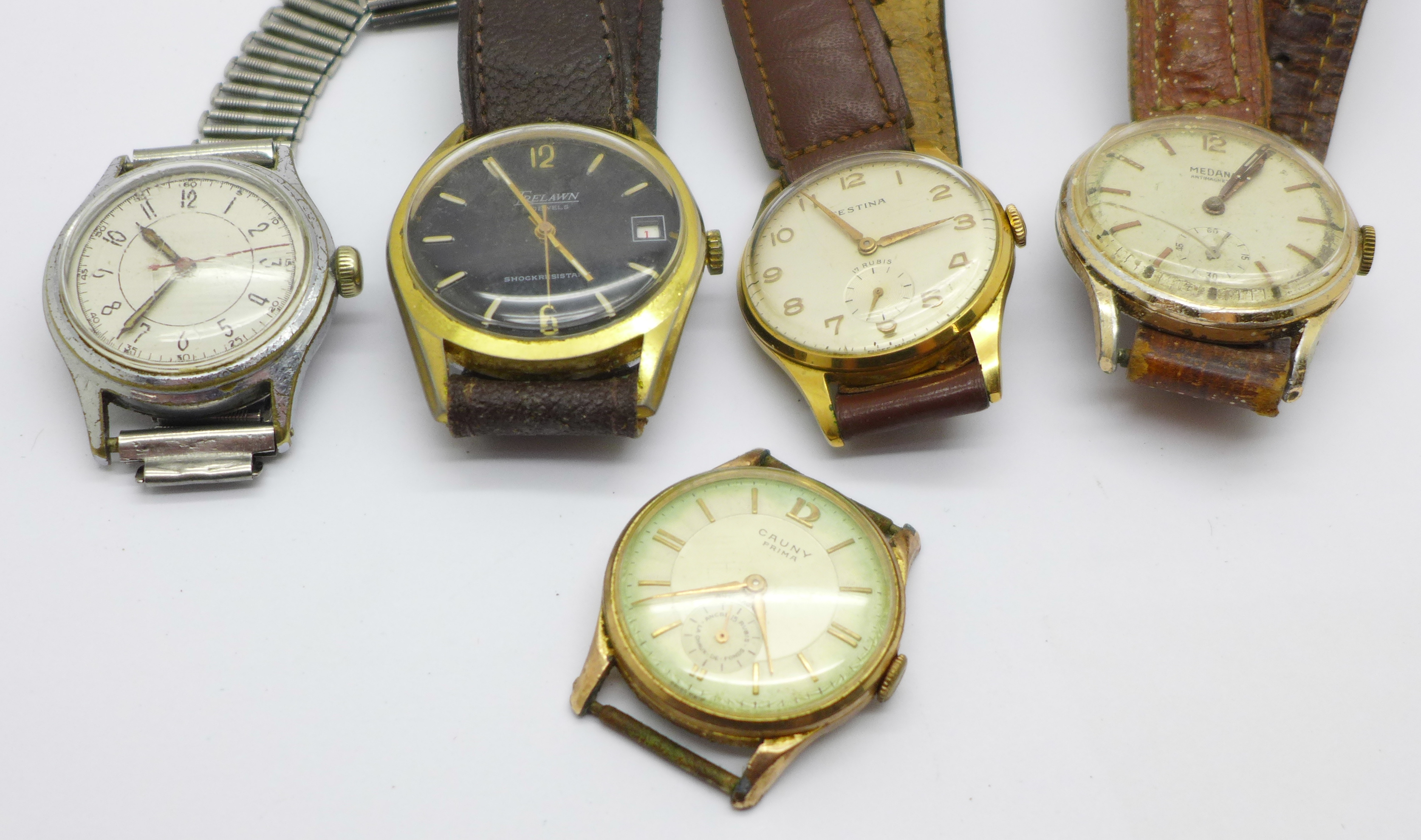 Five wristwatches including Festina