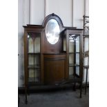 An Edward VII inlaid mahogany display cabinet