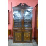 An Edward VII mahogany and marquetry inlaid bookcase