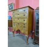 A Queen Anne style walnut tallboy