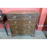 A George III style mahogany serpentine chest of drawers