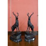 A pair of French style bronze stags,