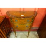 A Sheraton Revival painted satinwood petit demi lune commode