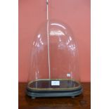 A glass clock dome,