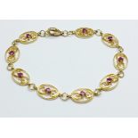 A 9ct gold and ruby bracelet, 8.