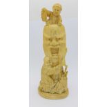 A carved ivory figure, 17.