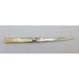 A mother of pearl and silver letter opener,