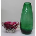 A green glass vase and a cranberry coloured glass ashtray