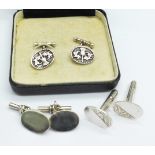 Three pairs of silver cufflinks