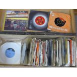 Over one hundred 45rpm vinyl records,
