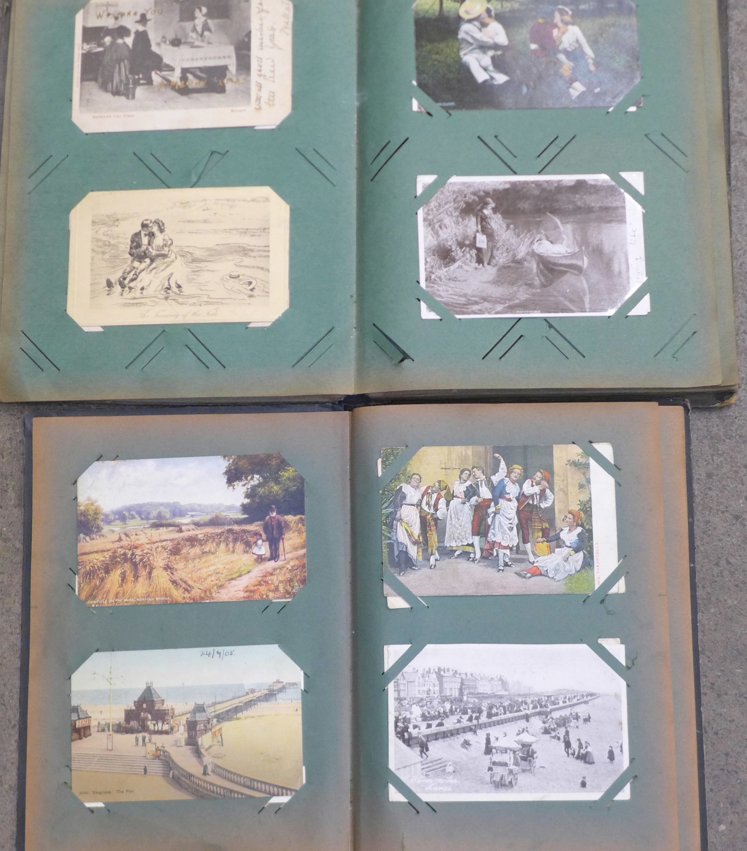 Two albums of approximately 200 Edwardian and later postcards
