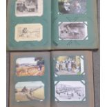 Two albums of approximately 200 Edwardian and later postcards