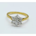 An 18ct gold and diamond cluster ring, 2.