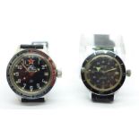 Two wristwatches with black dials,