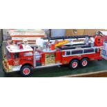A large battery operated fire engine ladder truck