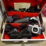 A Pentax camera body, lenses, etc.