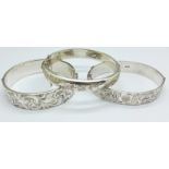 Three hallmarked silver bangles,