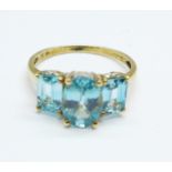 A 9ct gold, topaz and twelve diamond ring, 3.