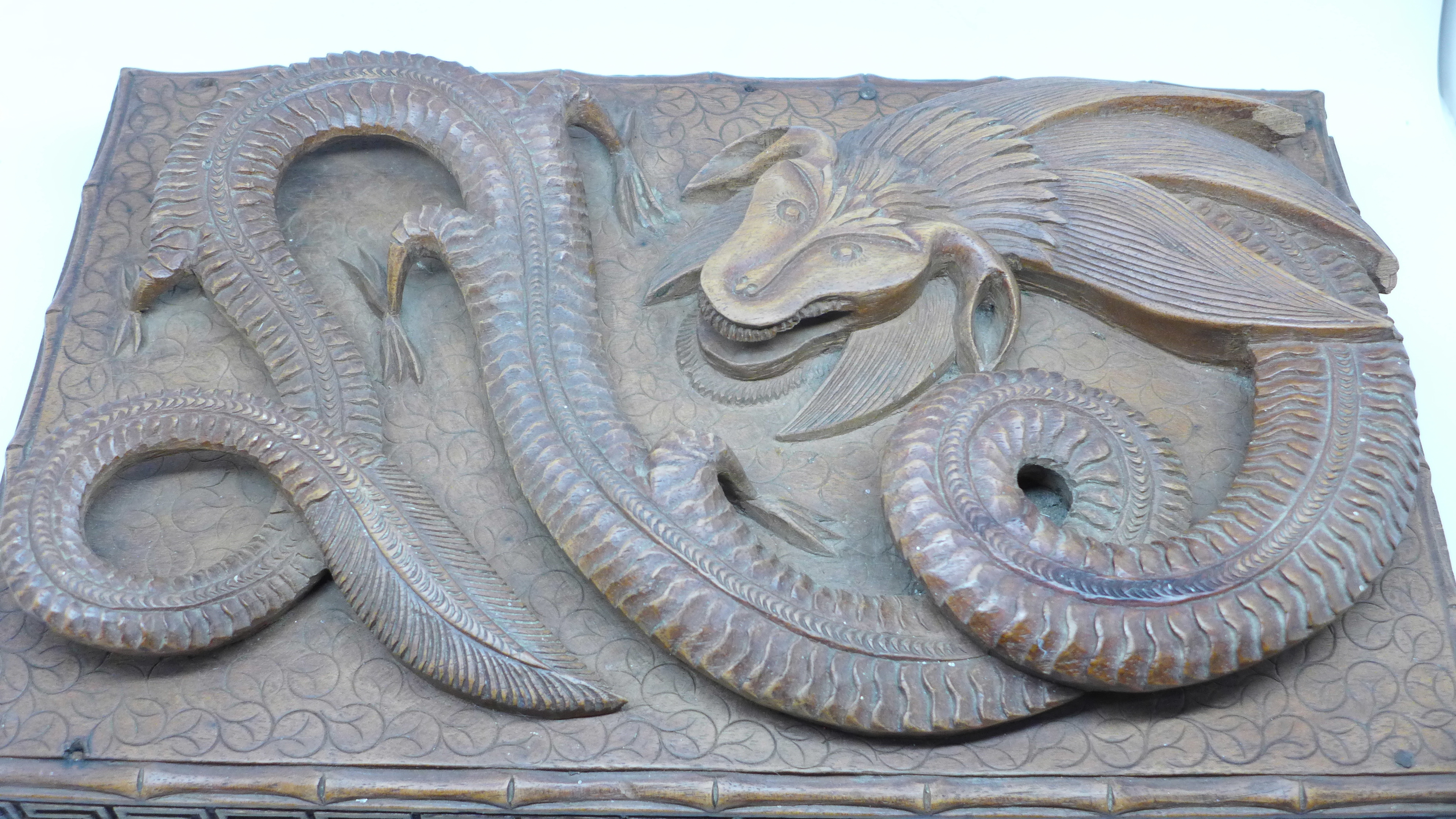 A Chinese carved wooden box with dragon top and carved side, - Image 2 of 4