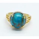 A matrix turquoise solitaire ring,