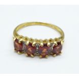 A 9ct gold, garnet and diamond ring, 2.