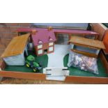 A toy farm set with animals,