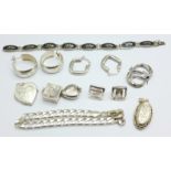 Four pairs of silver earrings, two silver bracelets,