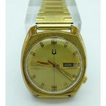 A gentleman's Bulova Accutron wristwatch with day date in gold plated case