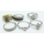 Six silver and stone set rings,