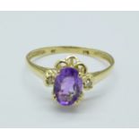 A 9ct gold, amethyst and diamond ring, 1.