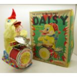 A Cragstan toy The Jolly Drumming Duck, Daisy, battery operated,