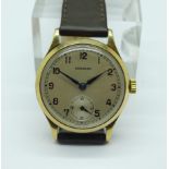 A gentleman's 9ct gold cased Garrard wristwatch,