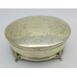 A silver oval trinket box,