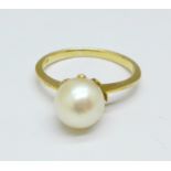 A yellow metal and pearl ring, 3.