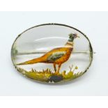 A crystal intaglio brooch depicting a pheasant,