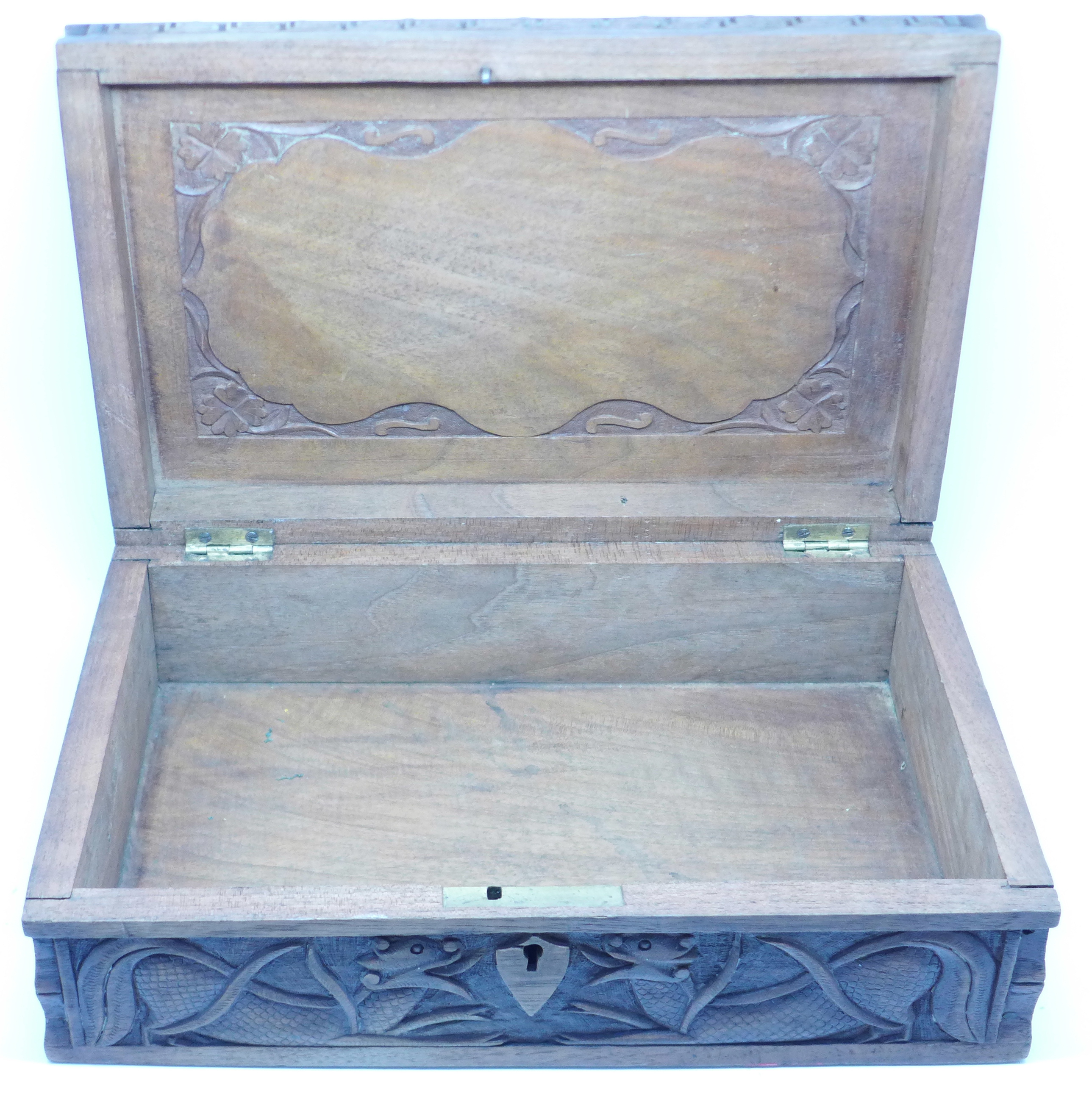 A Chinese carved wooden box with dragon top and carved side, - Image 4 of 4