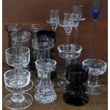 A collection of glass candle holders, etc.