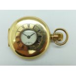 A gold plated half-hunter pocket watch