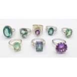 Eight silver and single coloured stone set rings
