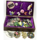Approximately forty costume brooches, total weight with box 0.