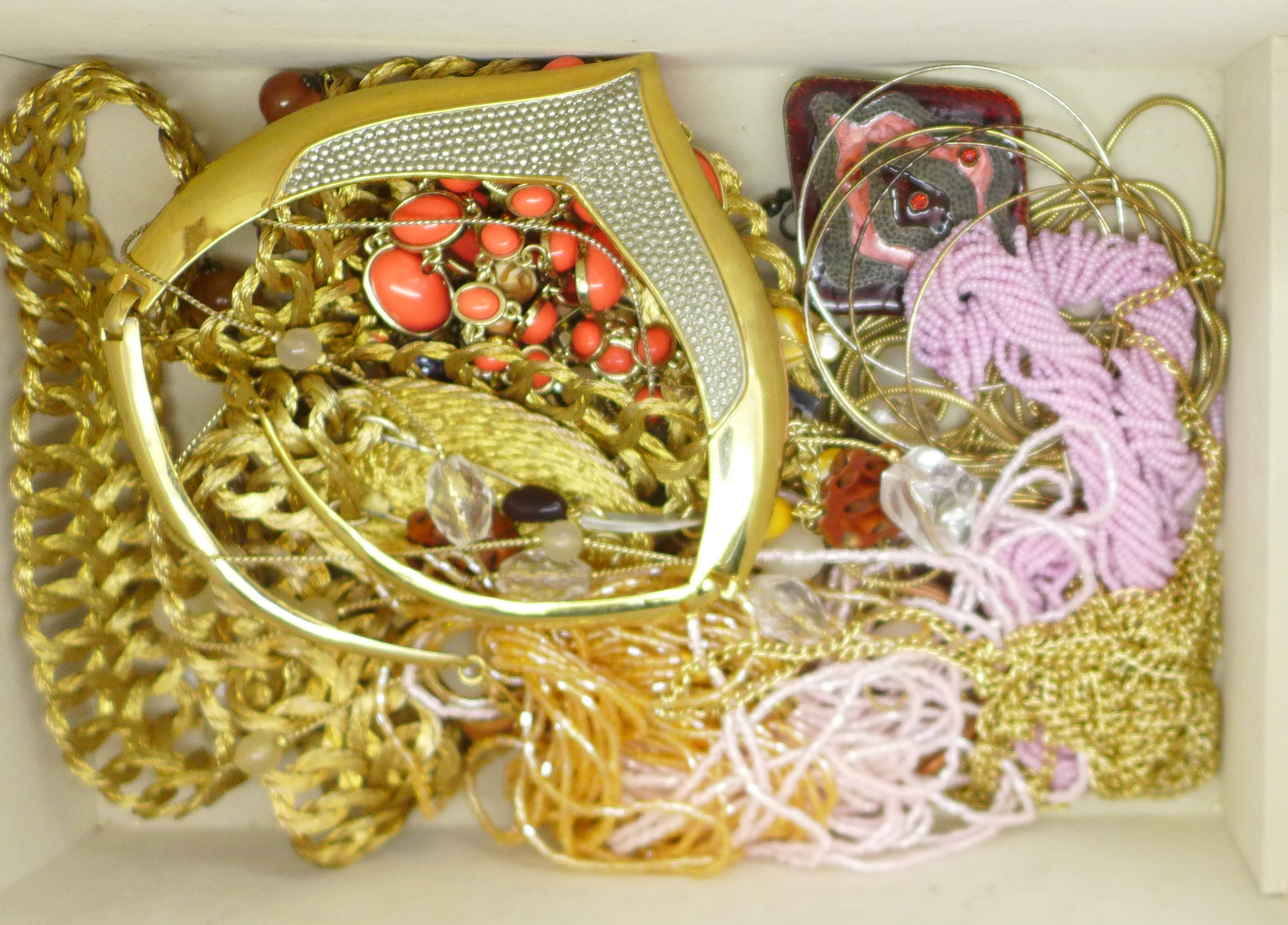 Costume jewellery in a large jewellery box, total weight 3.