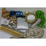 Costume jewellery, a vintage brush and comb and a cigarette case, etc.