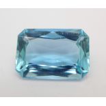An emerald cut aquamarine gemstone, 29mm x 20mm x 11mm, 49½ct weight, 9.