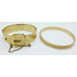 Two rolled gold bangles