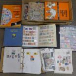 Four albums of stamps,
