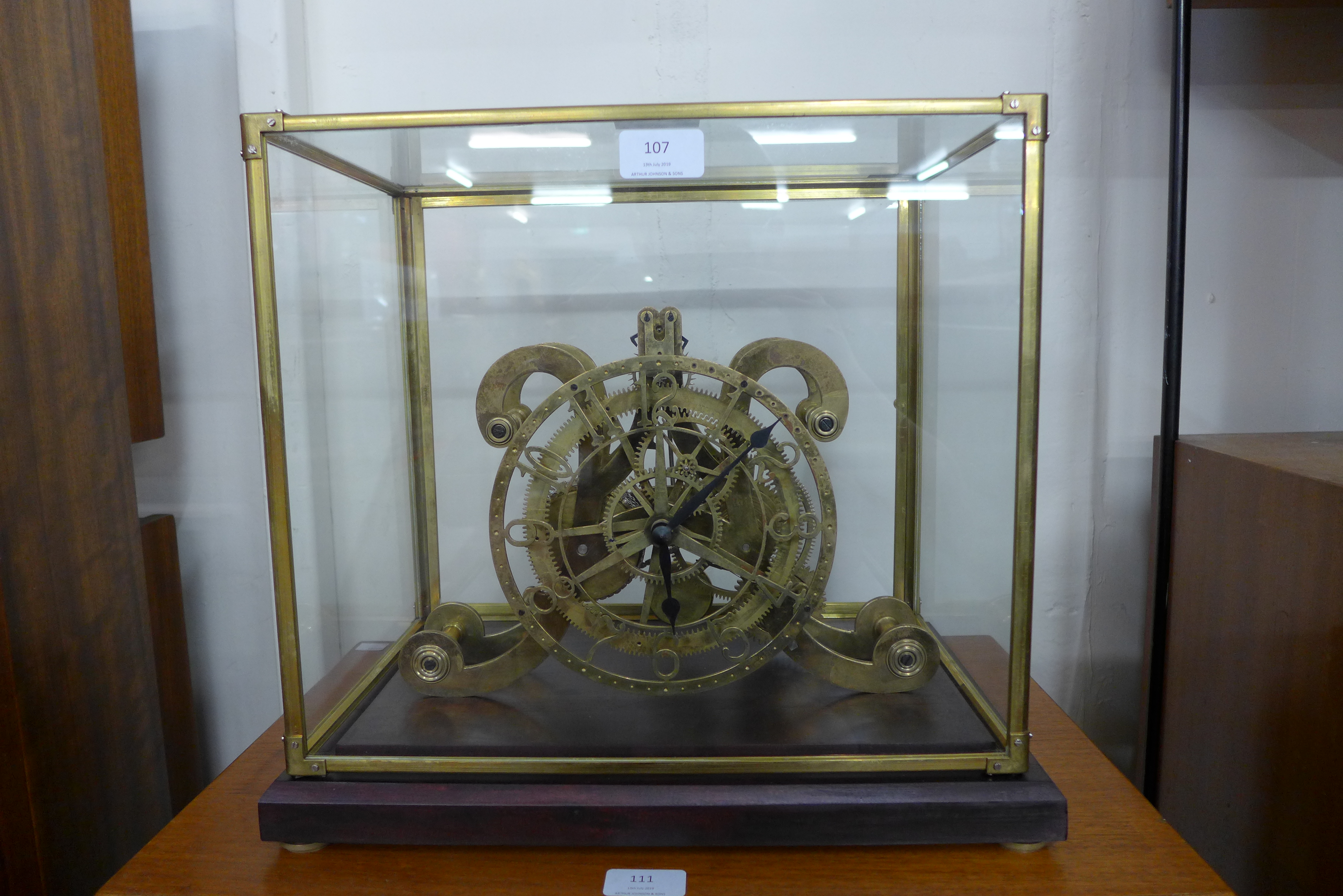 A gilt metal fusee skeleton clock,