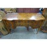 A yew wood sideboard