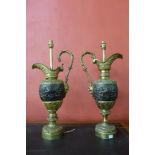 A pair of French bronze and ormolu ewer shaped table lamps